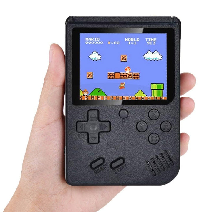 Toppvy av retro handhållen spelkonsol med tydliga knappar och joystick