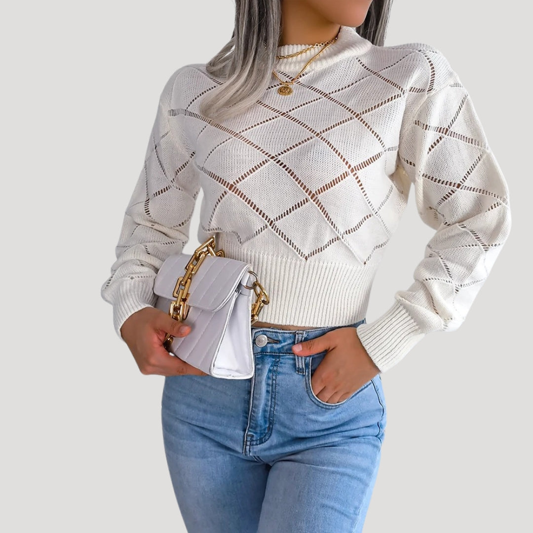 Kvinnors croppad stickad tröja med elegant hög hals. En modern pullover för dam, perfekt för trendiga outfits.