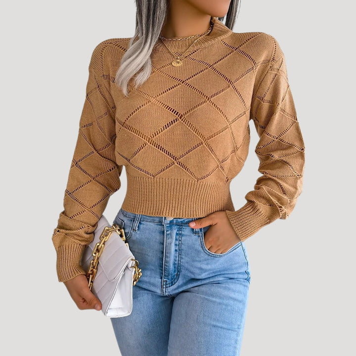 Bekväm stickad croppad pullover med hög hals. Mjuk damtröja, perfekt för både vardag och trendiga looks.