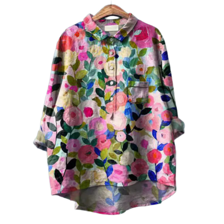Rosa damblus med elegant blomtryck, perfekt för en chic och bekväm stil under sommaren.