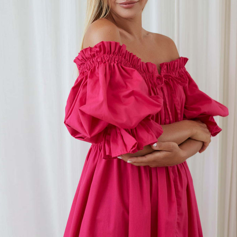 Rosa off-shoulder damklänning med lekfulla puffärmar. Elegant miniklänning för sommarfest och vardag, elastisk passform.