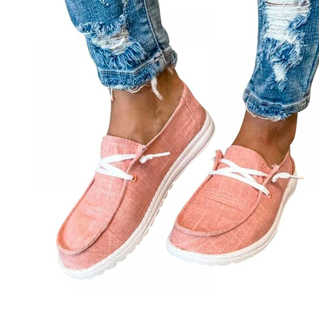 Rosa rutiga damskor i canvas loafers med snörning för en bekväm stil, framifrån