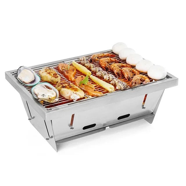 Mångsidig bärbar grill i rostfritt stål för utomhusmatlagning, camping, utekök och picknick.
