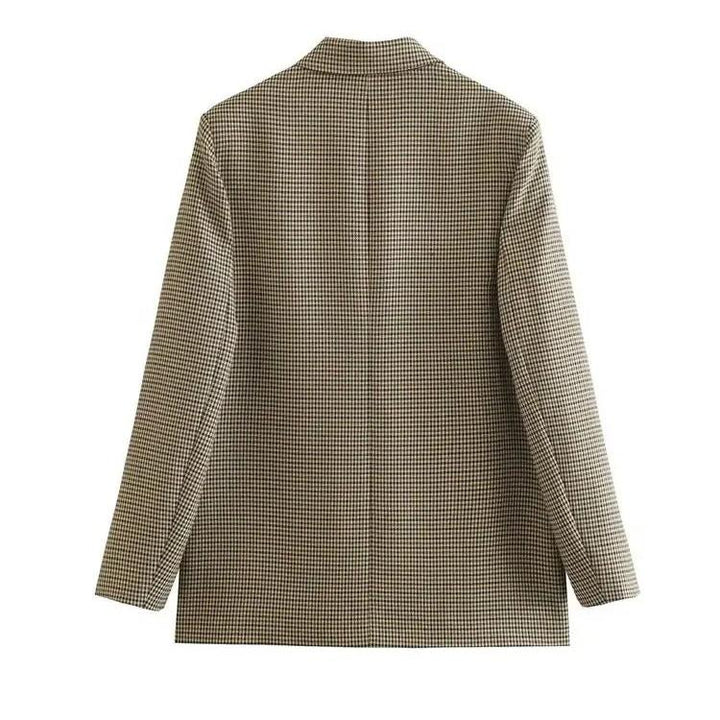 Elegant rutig vintage blazer för dam, perfekt höstmode som arbetskläder och fritidskläder.