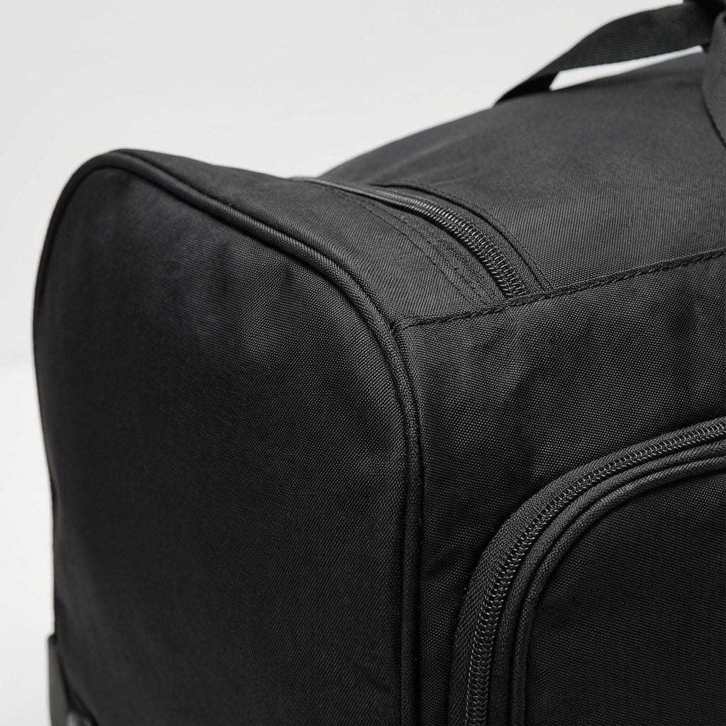 Stor hjulväska i slitstarkt Oxford-tyg, idealiskt bagage för långa resor och omfattande packning.