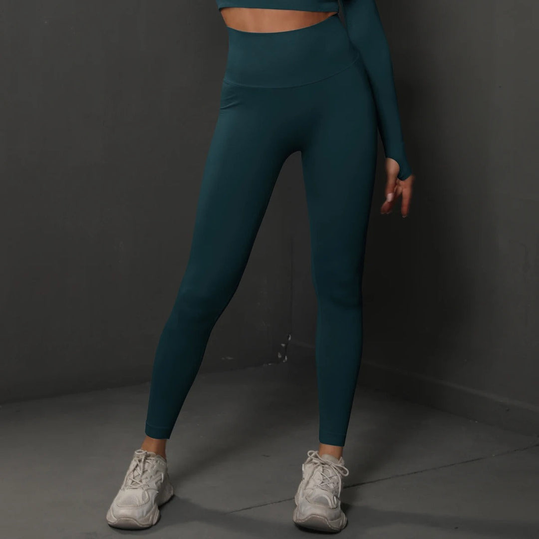 Sportiga sömlösa högmidjade leggings för kvinnors fitness. Mångsidiga aktivakläder med stretch.