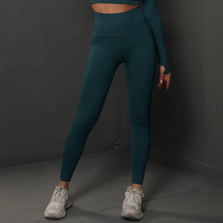 Sportiga sömlösa högmidjade leggings för kvinnors fitness. Mångsidiga aktivakläder med stretch.