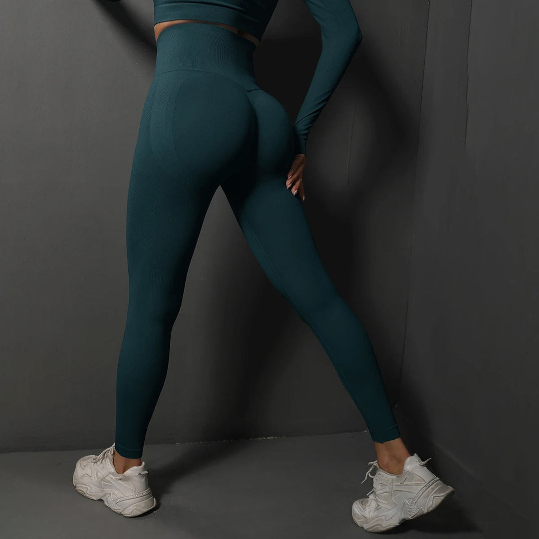 Kvinnors sömlösa yogaleggings med hög midja. Optimal stretch och bekvämlighet för alla positioner.