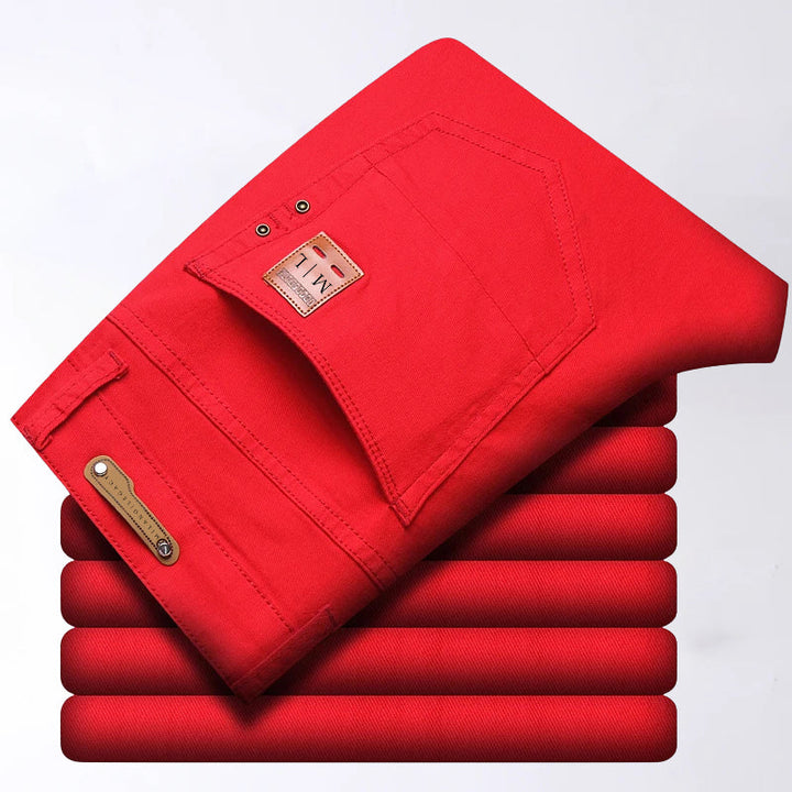 Bakifrån: Herr slim fit stretchjeans, detaljer med bakfickor & sömmar. Bekväma jeans med modern stil.