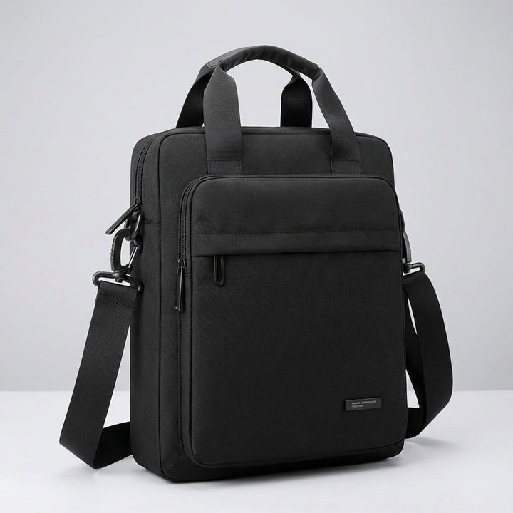 Vaylor unisex axelväska för laptop. Vattentät och organiserad budväska, idealisk för affärsresor och daglig användning.