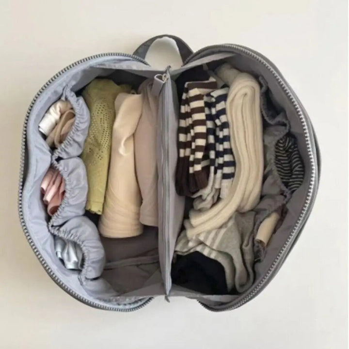 Effektiv Packify necessär för unisex reseförvaring. Kompakt organiseringspåse för hygienartiklar & accessoarer i grått.