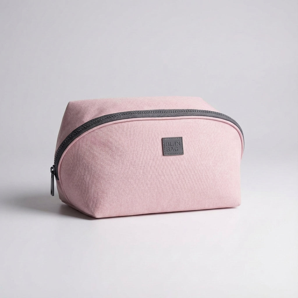 Hållbar Packify necessär i grå & rosa för smidig packning. Perfekt reseförvaring för hygienartiklar & små accessoarer.