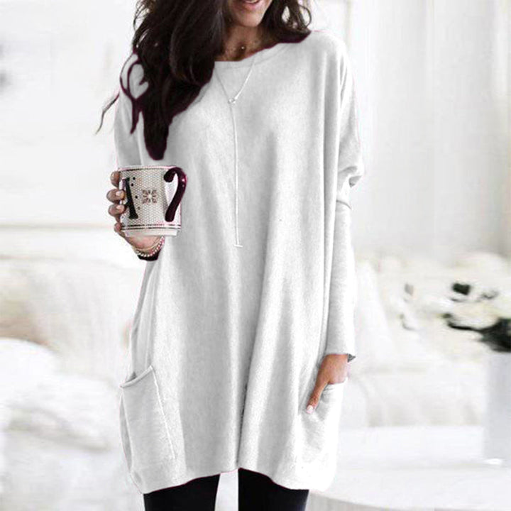 Elegant pullover för dam, i grå färg med avslappnad passform, långa ärmar och frontfickor.