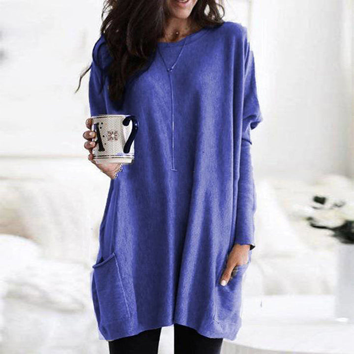 Bekväm och mångsidig kvinnors pullover med detaljerade fickor och ribbade muddar.