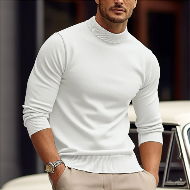 Långärmad herrtröja i bekvämt, stickat material. Perfekt för en avslappnad men stilren look. Vardagsmode för män.