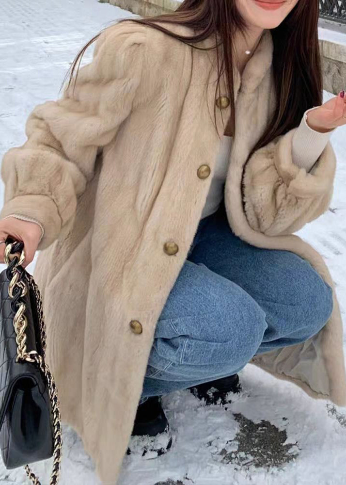Långärmad kvinnors tröja, idealisk för höst- och vårmode. O-hals, lös passform och stilren design för daglig komfort.