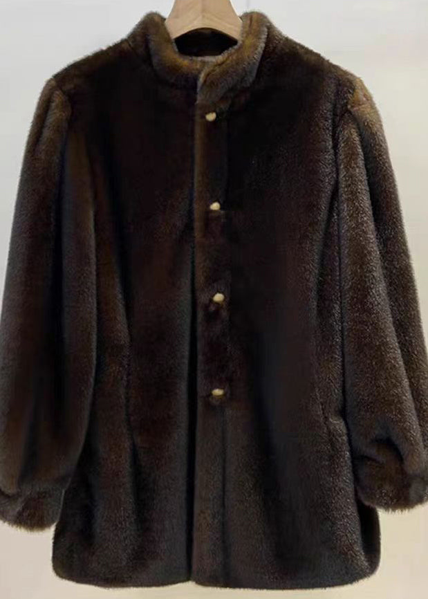 Avslappnad långärmad damtröja med O-hals. Lös passform ger maximal komfort, perfekt för en stilren och bekväm look.