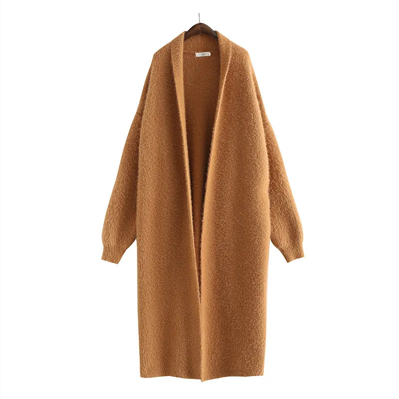 Elegant lång kofta i mjukt material, perfekt för kvinnors tröjor och en modern look.