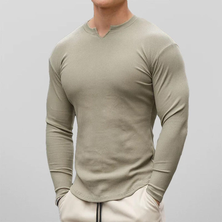 Mäns långärmade skjorta i modern design, idealisk för en bekväm och stilren vardagsoutfit.