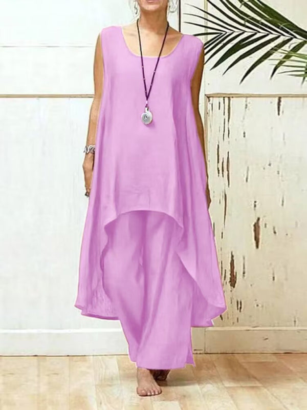 Bekväm ärmlös byxdress i dammodell med vida ben och elegant oregelbunden skärning, idealisk för varma dagar.