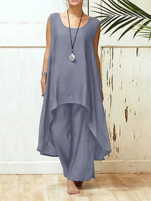 Somrig dam byxdress med ärmlös design, vida ben och oregelbundna detaljer, ett måste för stilrent mode under varma dagar.