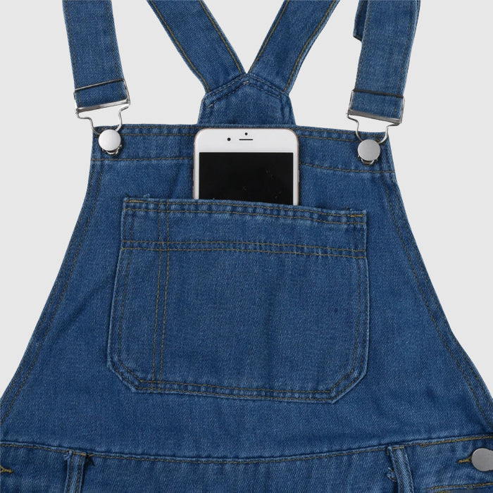 Modeinriktad unisex jumpsuit/overall i utility-stil, perfekt för streetwear med justerbar passform.