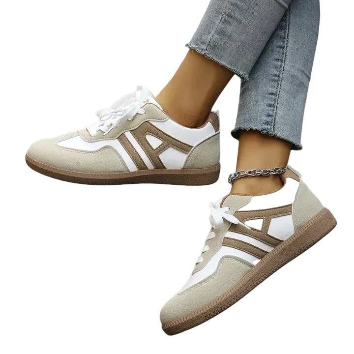 Sportiga dam sneakers i khaki och vitt, perfekta för vardagsbruk. Bekväma fritidsskor med snörning.