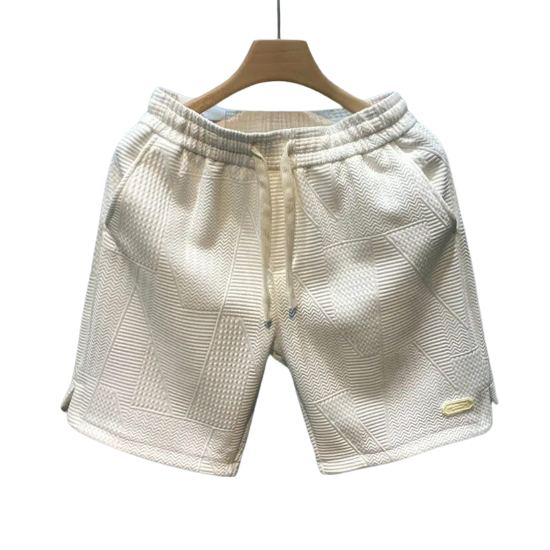 Bekväma löparshorts för män med vågmönster. Idealiska träningsshorts för aktiv livsstil och sport.