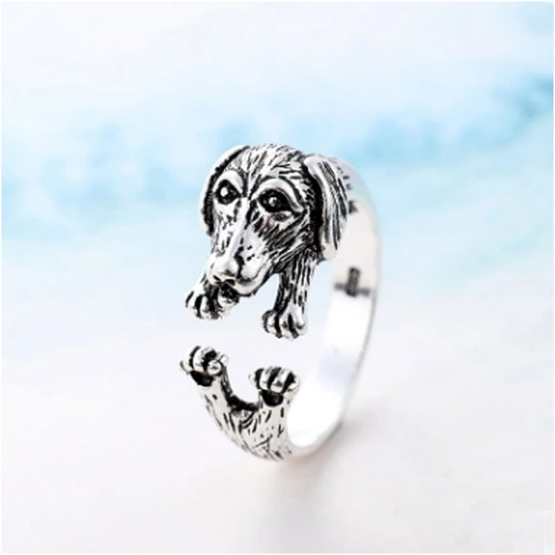 Visa din passion med denna justerbara taxring i sterling silver, en perfekt present.