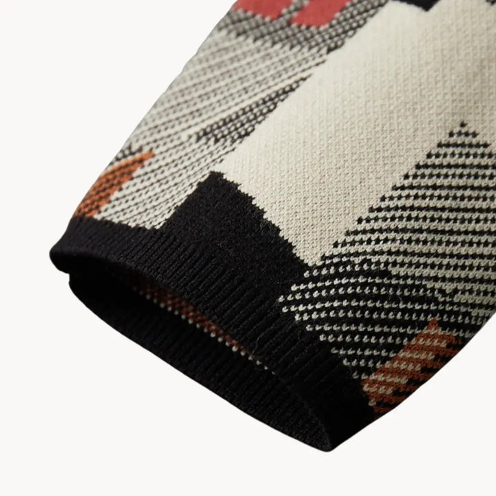 Bekväm stickad damkofta med abstrakt design, perfekt att bära för en stilsäker look.