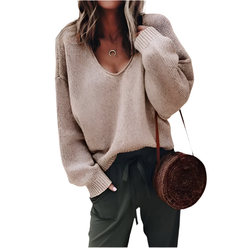 Stickad damtröja i tidlös design. Elegant pullover för bekvämt vardags- och höstmode. Mångsidiga damkläder.
