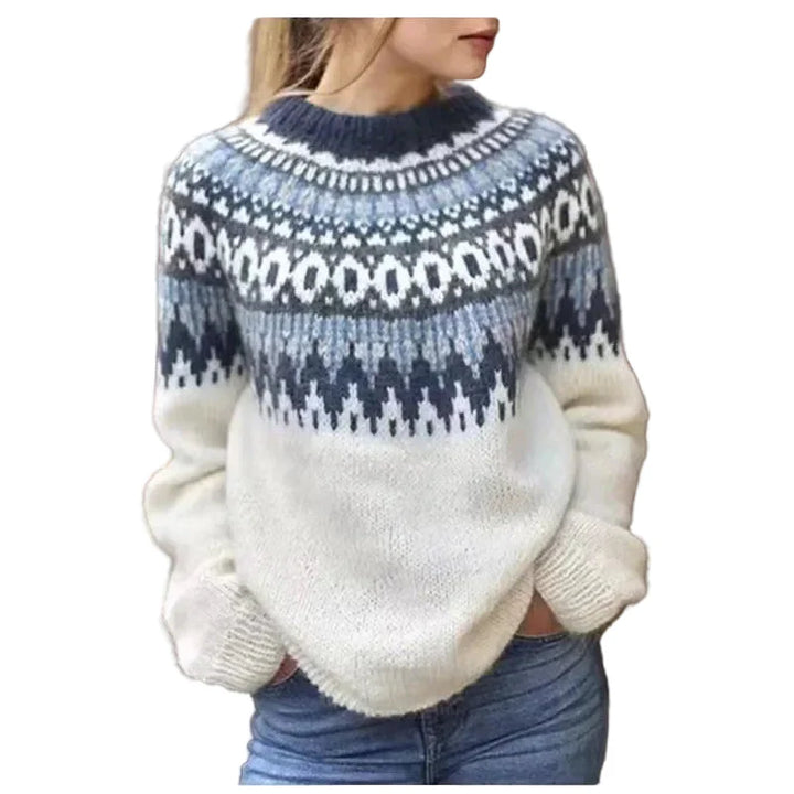 Stickad damtröja med rund hals. Bekväm pullover i färgglad färgblockering för trendig casual stil.