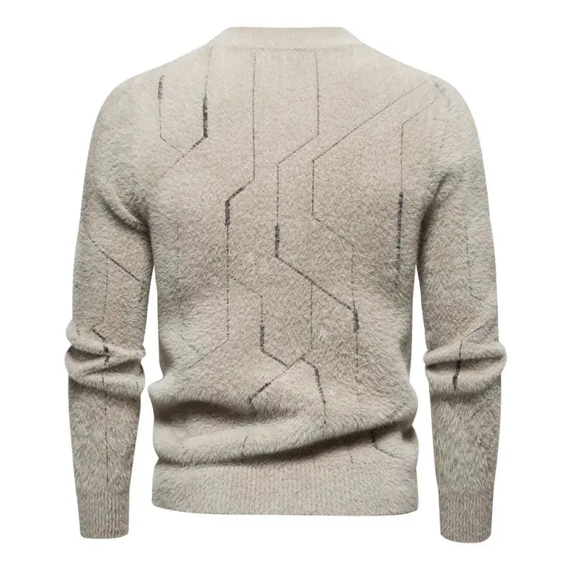 Bekväm, figurnära herrtröja, stickad för vardag och elegans. Höst/vinter komfort med stil.