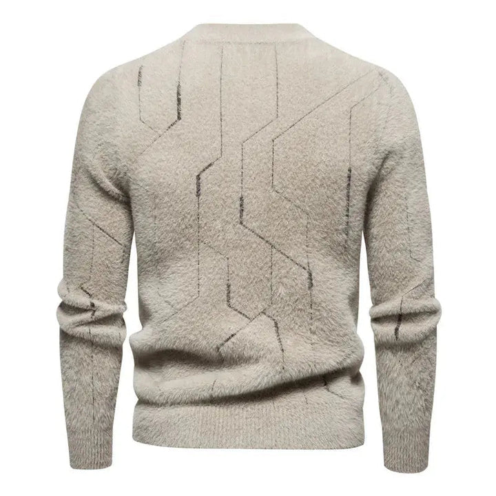 Bekväm, figurnära herrtröja, stickad för vardag och elegans. Höst/vinter komfort med stil.