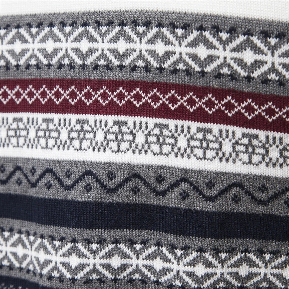 Stilren herrtröja med distinkt retro-mönster och modern halv dragkedja. Bekväm stickning.