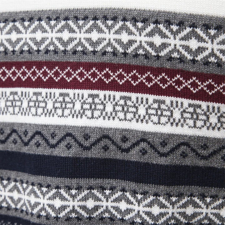 Stilren herrtröja med distinkt retro-mönster och modern halv dragkedja. Bekväm stickning.