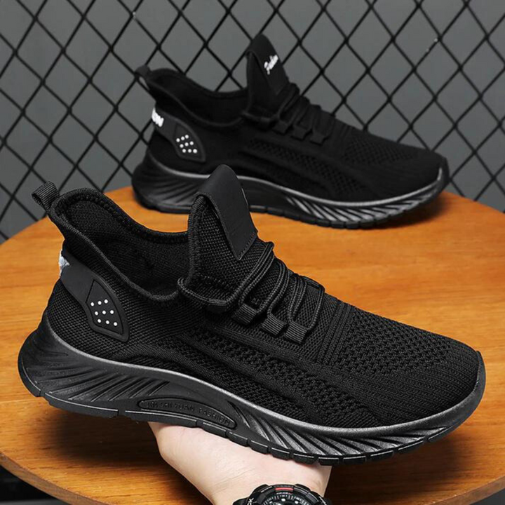 Stilrena andningsskor för dam i stickat nät, lätta och komfortabla sneakers för aktiv fritid.