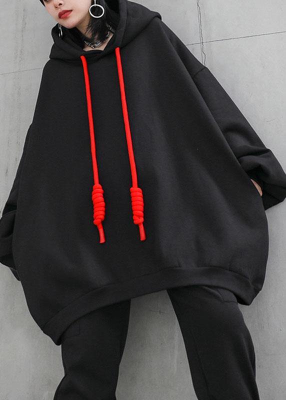 Trendig dam sweatshirt med huva, lös passform perfekt för lager-på-lager. Avslappnad vardagsstil för hösten.