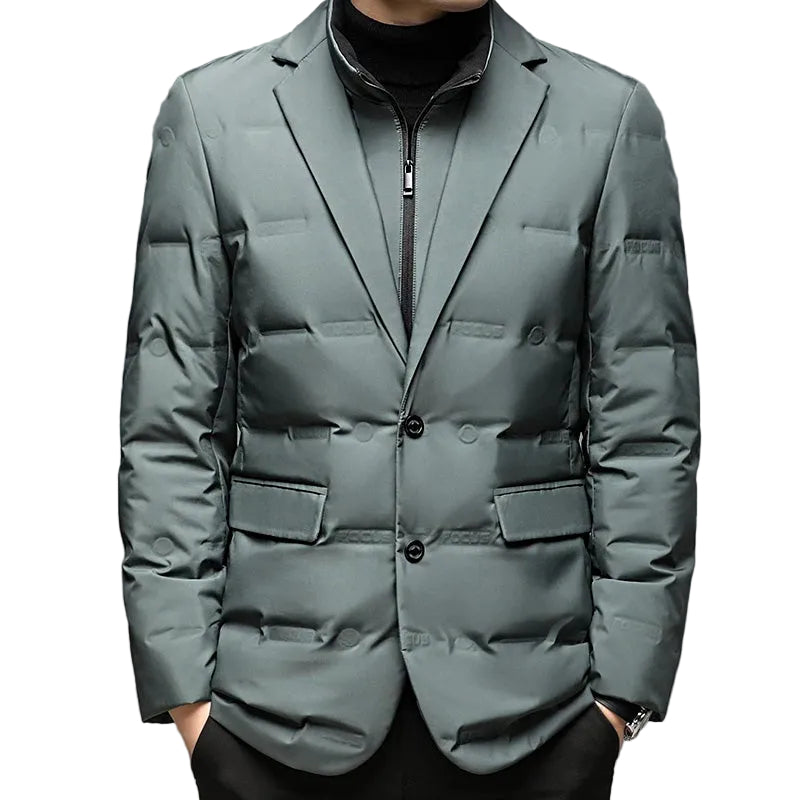 Stilren grön herr vinterjacka, vadderad för värme. Modern design perfekt för vardaglig casual mode.