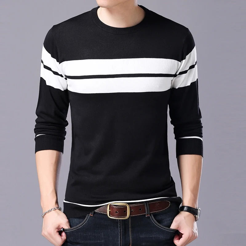 Höst-/vintermode: Herr pullover i stilren patchwork-design. Rundhalsad och varm tröja.