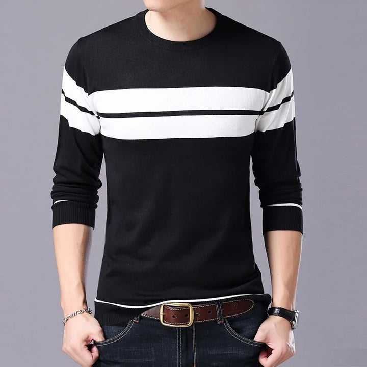 Höst-/vintermode: Herr pullover i stilren patchwork-design. Rundhalsad och varm tröja.