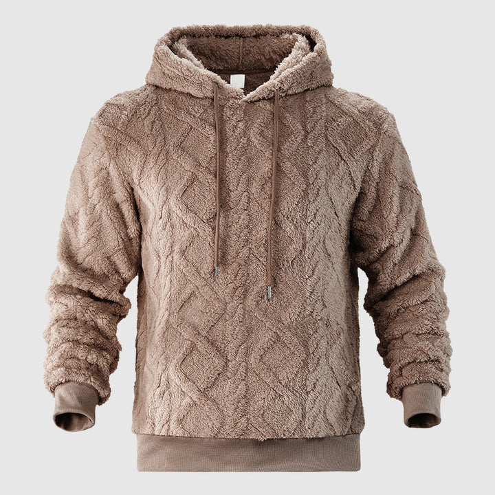 Modern herrhoodie med dragsko och stilren design. Mjuk och bekväm för både höst och vinter.