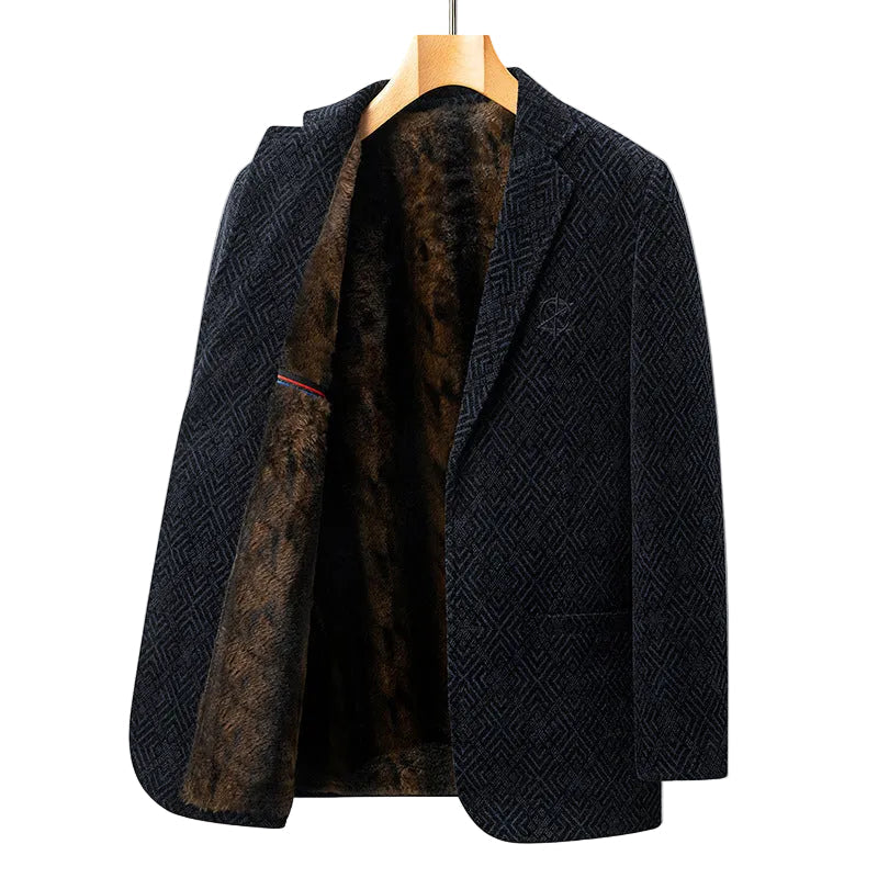 Stilren herrjacka för vinter med skräddarsydd passform och texturerat mönster. Varm och elegant vinterjacka.