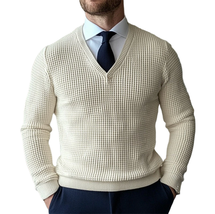 Stilren herrtröja med v-ringning i mjuk bomullsblandning för komfortabel vardag och elegant höstmode.