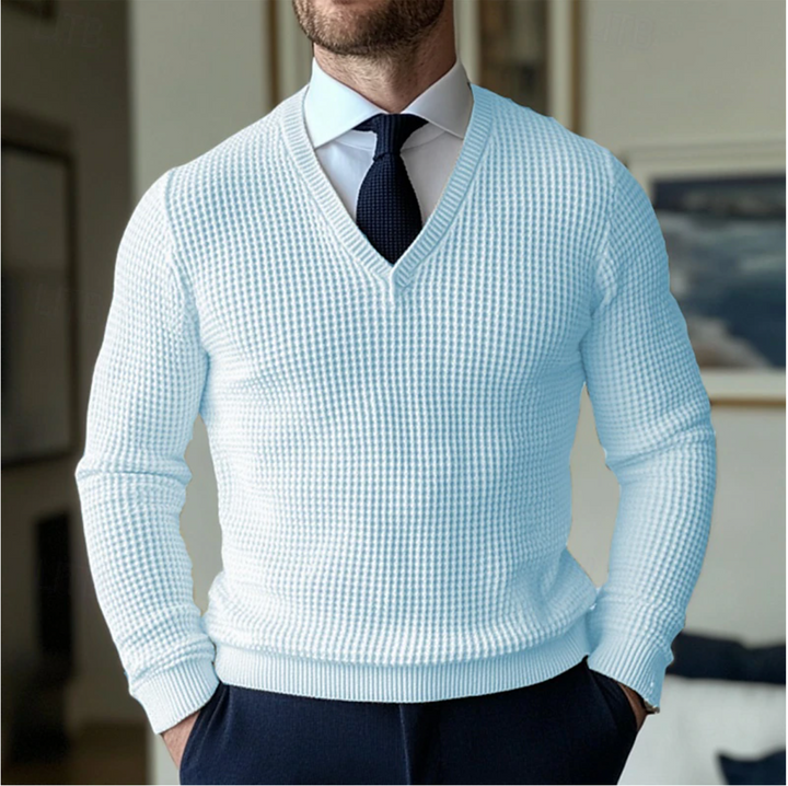 Elegant herrtröja med V-ringning, en stilren bomullsblandning som lyfter din vardagslook.