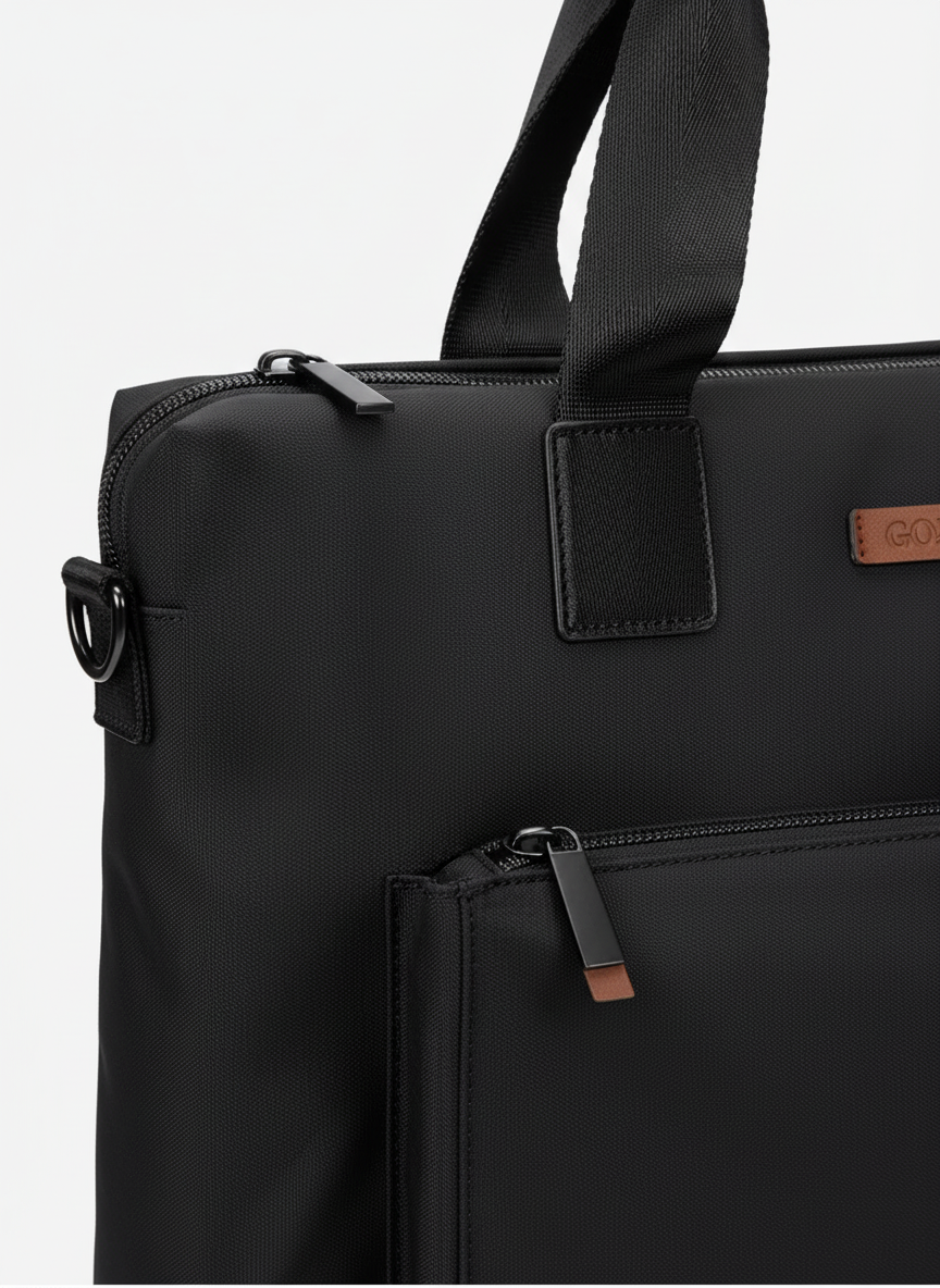 Grå unisex laptopväska BizJack. Rymlig och stilren affärsväska för arbete, med fack för dator & tillbehör.
