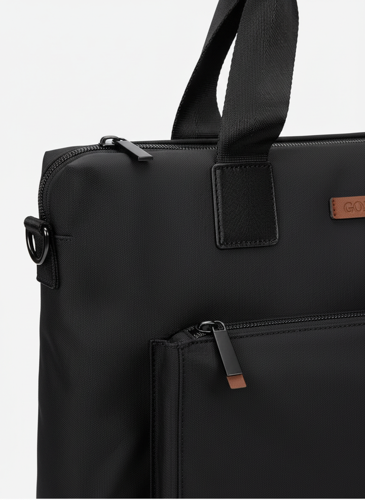 Grå unisex laptopväska BizJack. Rymlig och stilren affärsväska för arbete, med fack för dator & tillbehör.