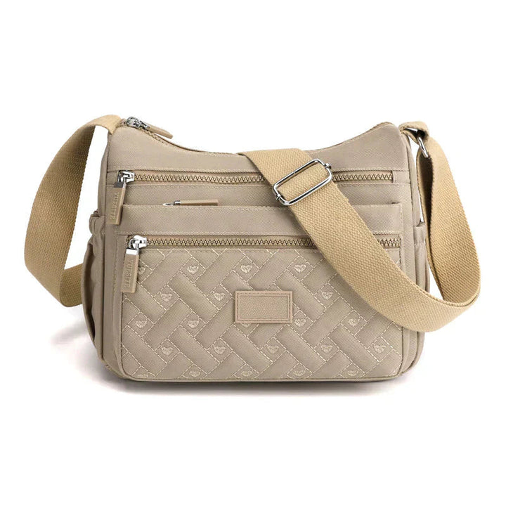 Vardagsväska för kvinnor: snygg crossbody perfekt för jobb, shopping och fritid. Stilren accessoar.