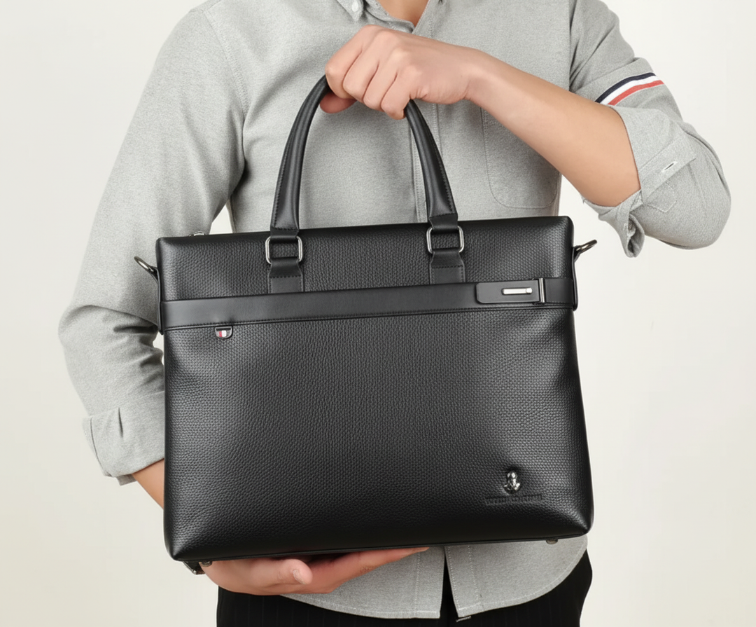 Elegant brun businessväska i PU för laptop, perfekt för professionella möten, affärsresor och pendling.