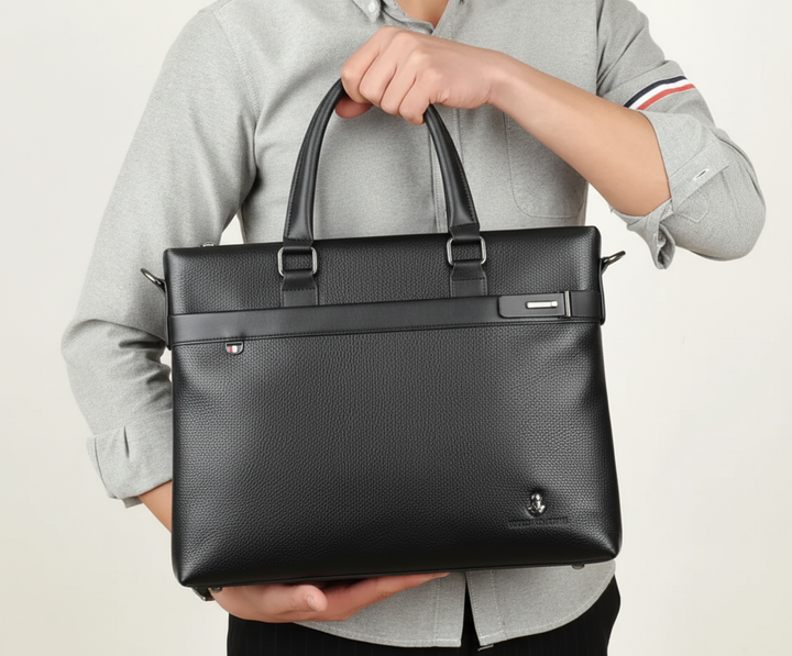 Elegant brun businessväska i PU för laptop, perfekt för professionella möten, affärsresor och pendling.